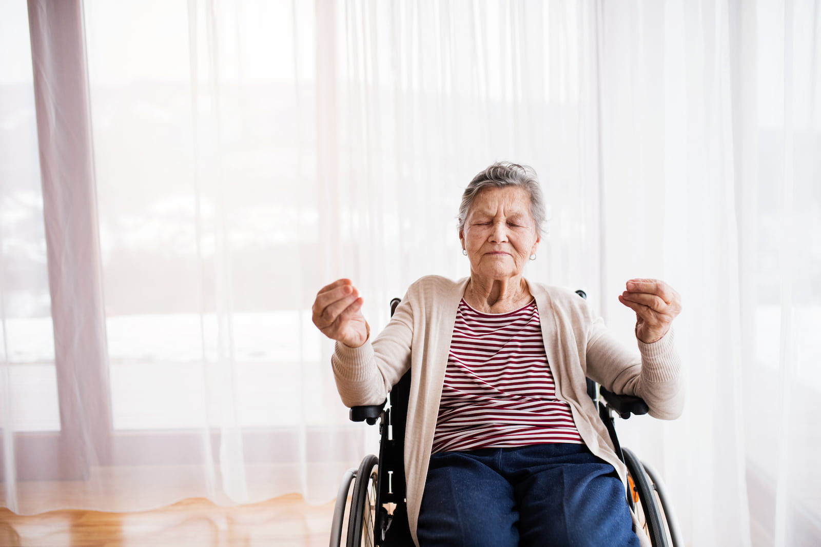 an elderly woman in a wheelchair