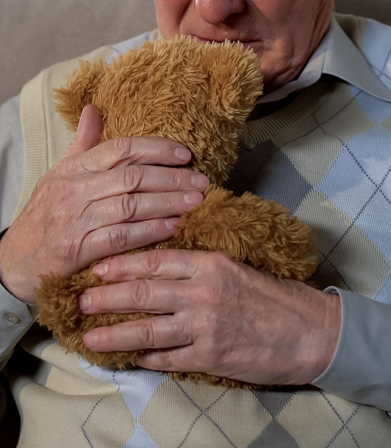 an elderly woman with a dog